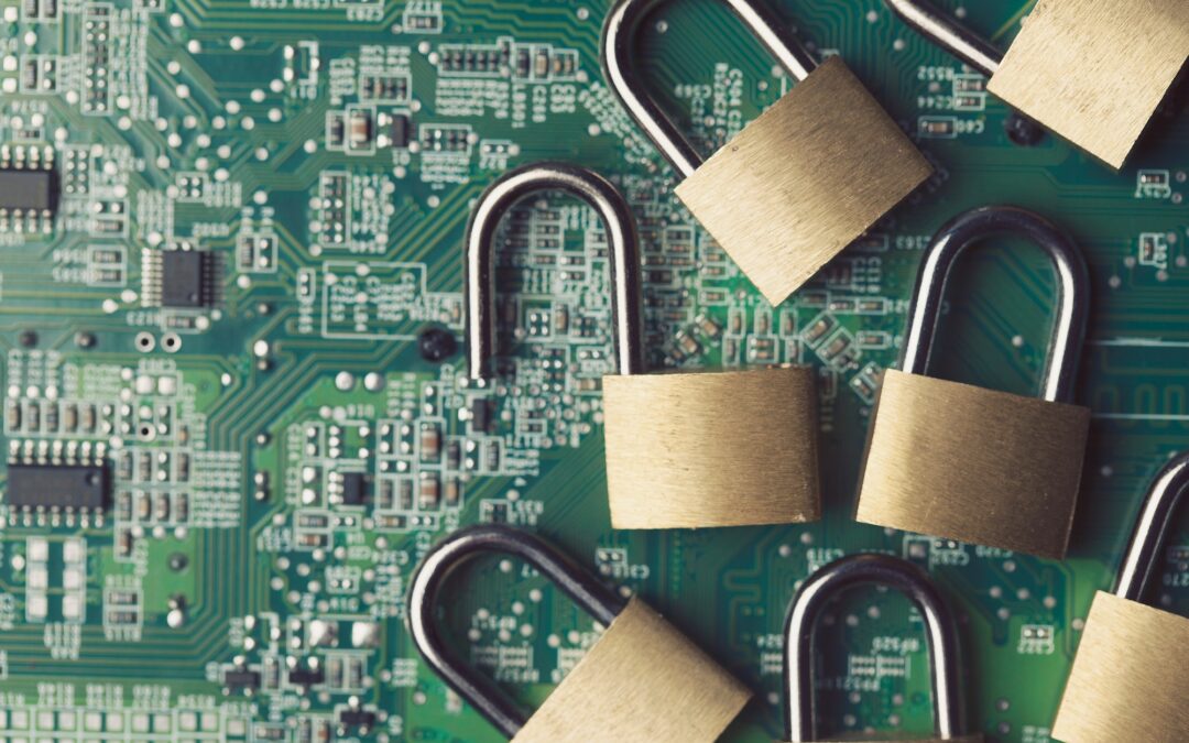 Technology security. Padlocks on a computer circuit board
